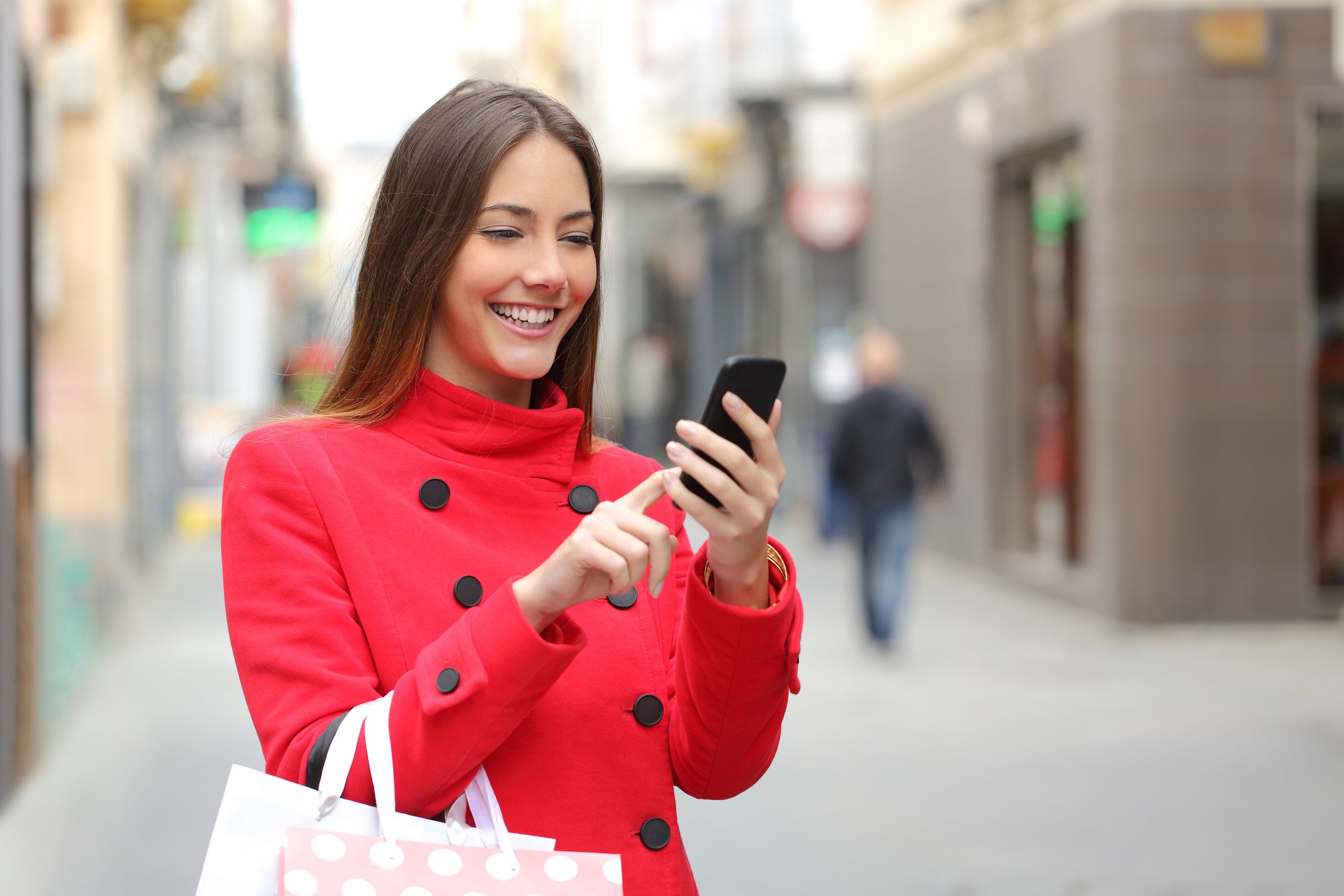 Shopper,Woman,Buying,Online,On,The,Smart,Phone,In,The
